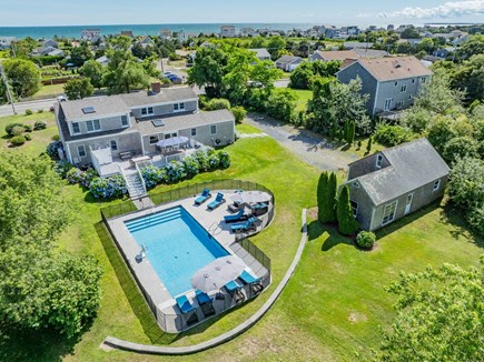 West Dennis Cape Cod vacation rental - Aerial of the back yard and pool
