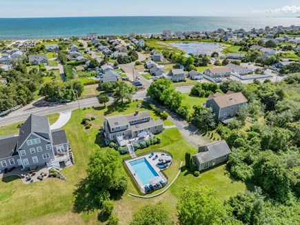 West Dennis Cape Cod vacation rental - Aerial of the back yard and pool