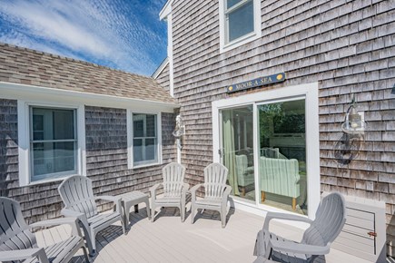 West Dennis Cape Cod vacation rental - Seating area on side deck