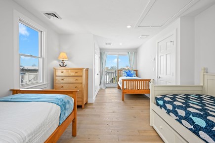 Sandwich Cape Cod vacation rental - Bedroom 3 – Four Twin beds (including one trundle) with Juliet balcony – Upper level
