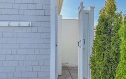 Sandwich Cape Cod vacation rental - Pristine outdoor shower with hooks for towels and clothes.