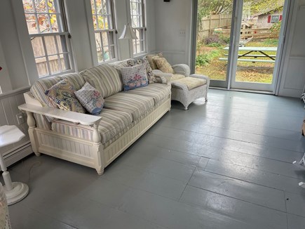 West Harwich Cape Cod vacation rental - Sunroom looking out at picnic table