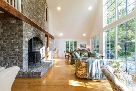Chatham, Marshlight Retreat Cape Cod vacation rental - Stone fireplace and cozy seating for after beach nights