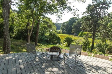 Chatham, Marshlight Retreat Cape Cod vacation rental - Fire pit seating on deck overlooking marsh and creek