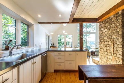 Chatham, Marshlight Retreat Cape Cod vacation rental - Open kitchen views to dining area and deck
