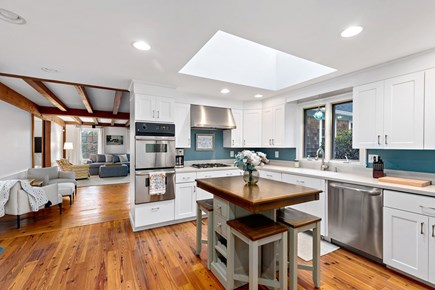 Orleans, Love & Luck Cape Cod vacation rental - Skylit kitchen with island seating