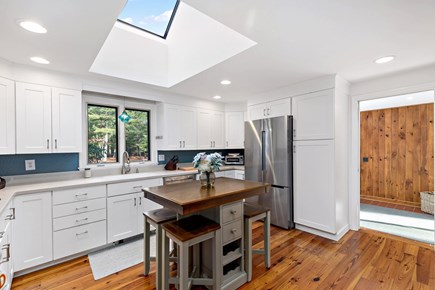 Orleans, Love & Luck Cape Cod vacation rental - Bright kitchen with prep island