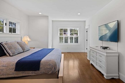 Harwich Cape Cod vacation rental - Primary bedroom on main floor with a King bed