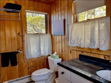 Orleans Cape Cod vacation rental - Primary bedroom bathroom with tub & shower
