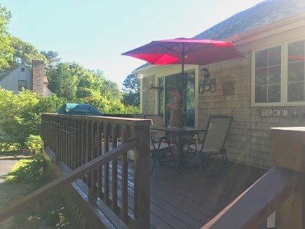 Brewster Cape Cod vacation rental - Large deck with umbrella shaded dining table.