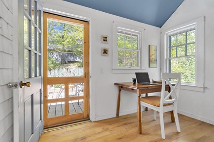 Wellfleet Cape Cod vacation rental - Sun porch with workspace and door to deck