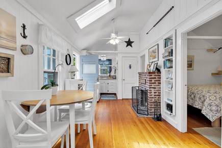 Wellfleet Cape Cod vacation rental - Dining area with the kitchen beyond