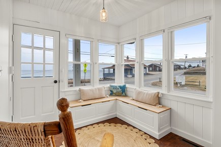 Plymouth MA vacation rental - Sitting area with storage with view of the ocean.