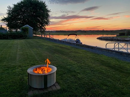 Yarmouth Cape Cod vacation rental - Backyard Fire Pit Overlooking Water