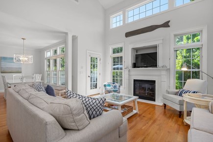 Chatham Cape Cod vacation rental - The light and bright living room with vaulted ceilings and fireplace