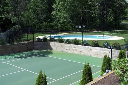 Chatham Cape Cod vacation rental - Have fun in the sun with access to the community pool and tennis court. Both of these amenities are only 130 steps from the home!