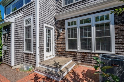 Chatham Cape Cod vacation rental - Doorway leading to the patio from the space between the living and dining room