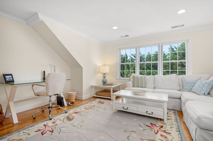 Chatham Cape Cod vacation rental - Loft seating area with remote workspace and Queen pullout