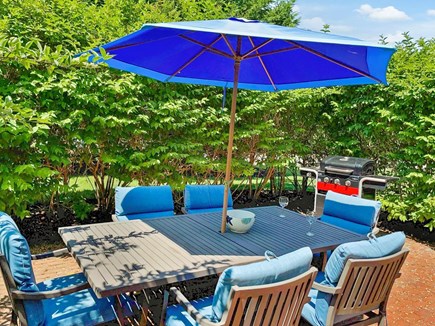 Chatham Cape Cod vacation rental - Patio with grill and outdoor dining set with umbrella