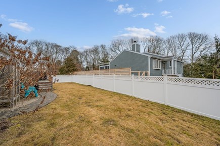 Bourne Cape Cod vacation rental - Backyard with privacy fence