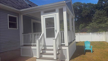 Bourne Cape Cod vacation rental - View of screened in porch next to fully enclosed outdoor shower
