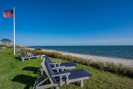 South Yarmouth Cape Cod vacation rental - Chaise lounge chairs lining the entirety of the beachfront bluff at Seaside.