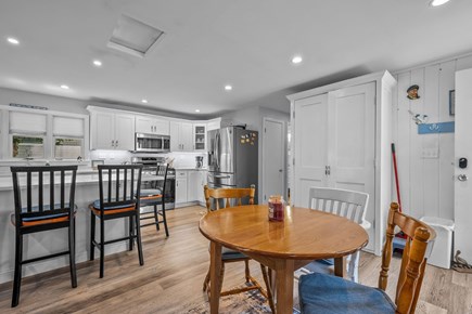 Mashpee Cape Cod vacation rental - Dining area with a view of the kitchen