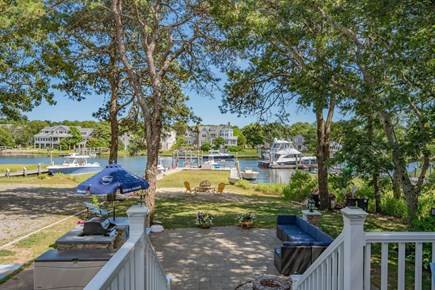 Mashpee Cape Cod vacation rental - View of backyard from the deck