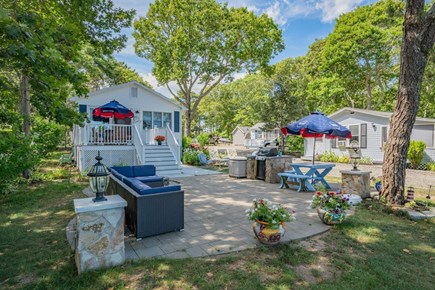Mashpee Cape Cod vacation rental - Communal patio with lounge area