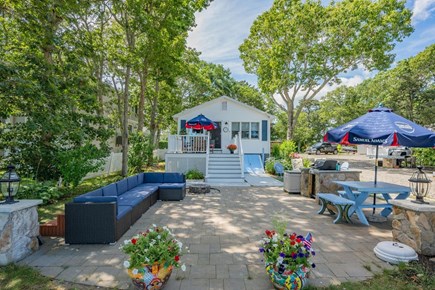 Mashpee Cape Cod vacation rental - Communal patio with lounge area