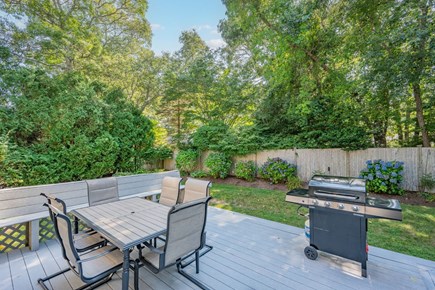 Osterville Cape Cod vacation rental - Deck with dining table and grill