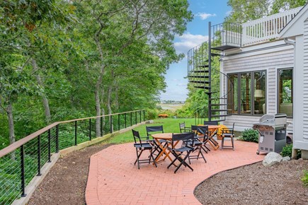 Centerville Cape Cod vacation rental - Outdoor patio with grill and dining tables