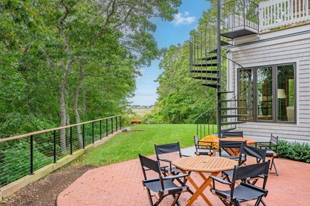 Centerville Cape Cod vacation rental - Backyard patio perfect for outdoor meals