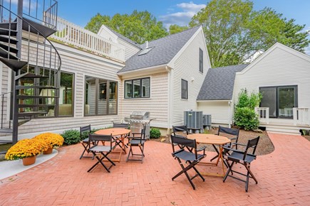 Centerville Cape Cod vacation rental - Backyard patio perfect for outdoor meals