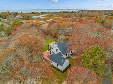 Centerville Cape Cod vacation rental - Aerial view capturing the property and adjacent marshland