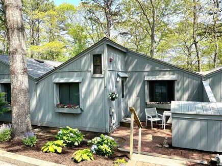 Mashpee Cape Cod vacation rental - Entrance to home with outdoor dining area