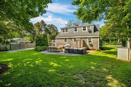 Yarmouth Cape Cod vacation rental - Backyard ( update:has fence now on the right open side)