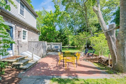 Yarmouth Port Cape Cod vacation rental - Back patio  with outdoor dining option
