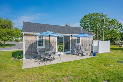 West Dennis Cape Cod vacation rental - Back patio with outdoor shower