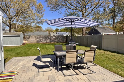 West Yarmouth Cape Cod vacation rental - Outdoor patio with dining area