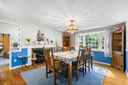 West Yarmouth Cape Cod vacation rental - Dining area with seating for 6 and fireplace