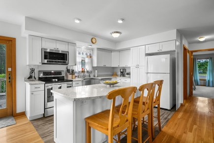 Harwich Cape Cod vacation rental - Kitchen and island with seating