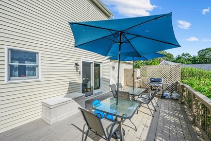 Harwich Cape Cod vacation rental - Back deck with seating