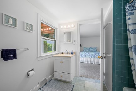 Harwich Cape Cod vacation rental - Bathroom 3- Jack and Jill full with tub and shower combination- Lower level