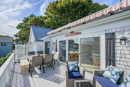 Harwich Cape Cod vacation rental - Deck with seating and dining area