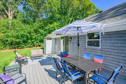 Yarmouth Port Cape Cod vacation rental - Outdoor dining area with umbrella