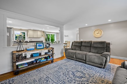 Yarmouth Port Cape Cod vacation rental - Living room looking into the kitchen and dining area