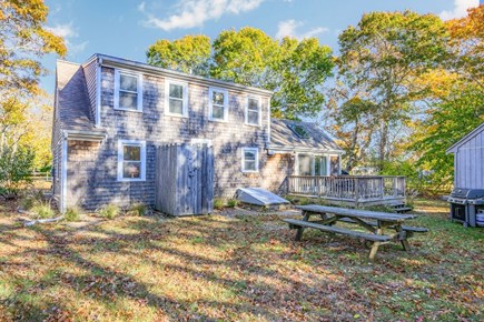 South Yarmouth Cape Cod vacation rental - Charming picnic table in the backyard, perfect for outdoor meals