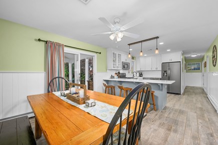 Eastham Cape Cod vacation rental - Dining area with a clear view of the fully equipped kitchen