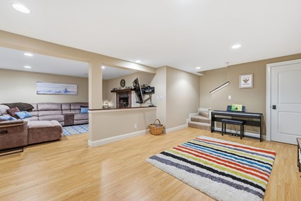Eastham Cape Cod vacation rental - Lower-level lounge with comfortable sectional seating